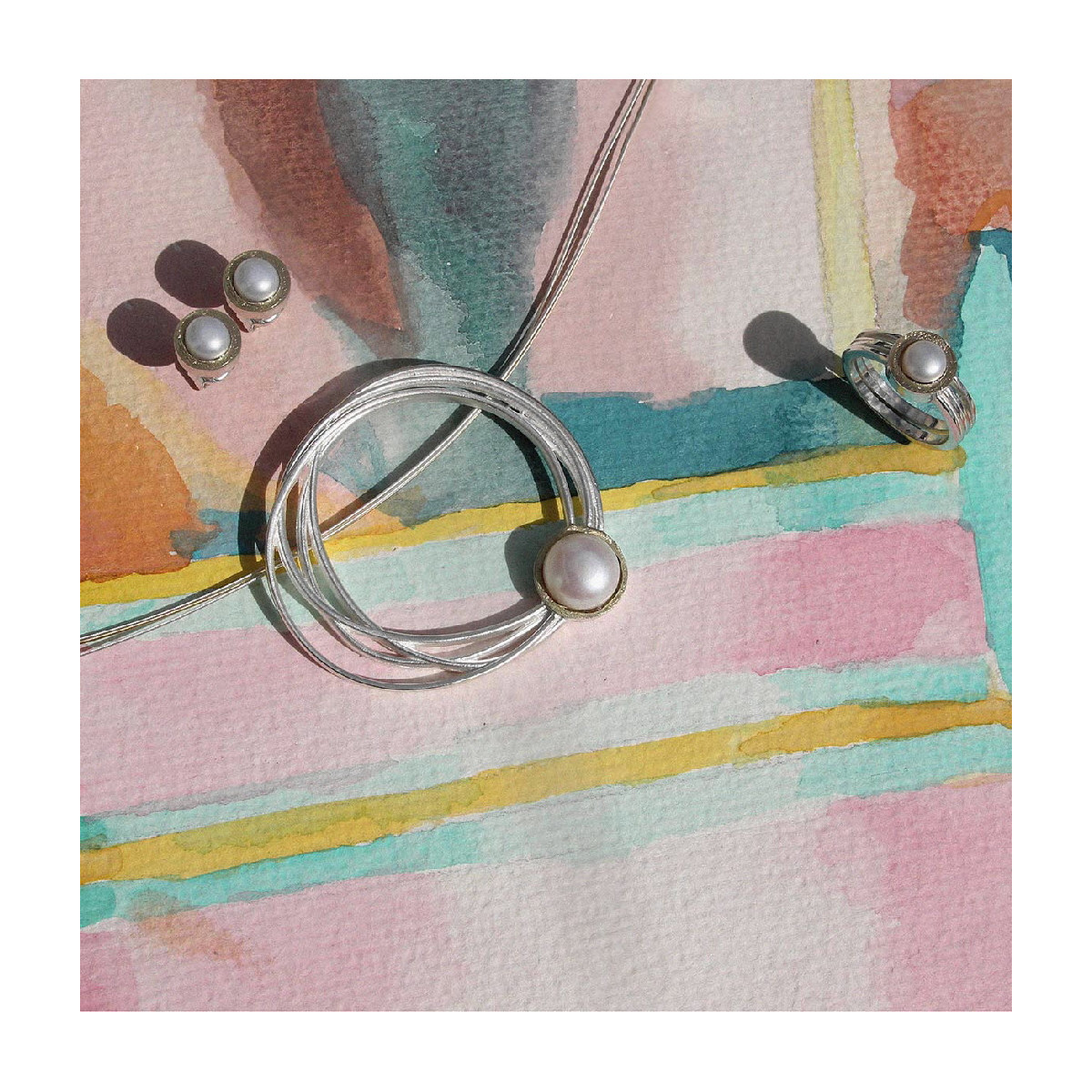 COLGANTE DE PLATA Y ORO CON PERLA